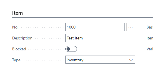 The Item card Item section with Test Item typed into the Description field