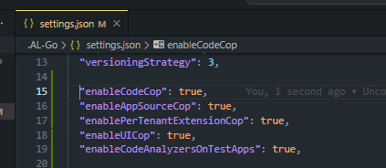 AL-Go settings.json with CodeCop, AppSourceCop, PerTenantExtensionCop, UICop, and analyzers on test apps enabled.