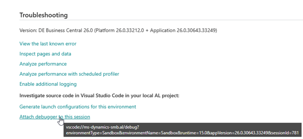 The Business Central troubleshooting page, with Attach debugger to this session and the vscode URL it opens