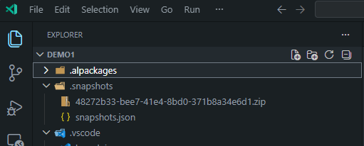 VS Code Explorer showing a .snapshots folder containing a snapshot ZIP file and snapshots.json.